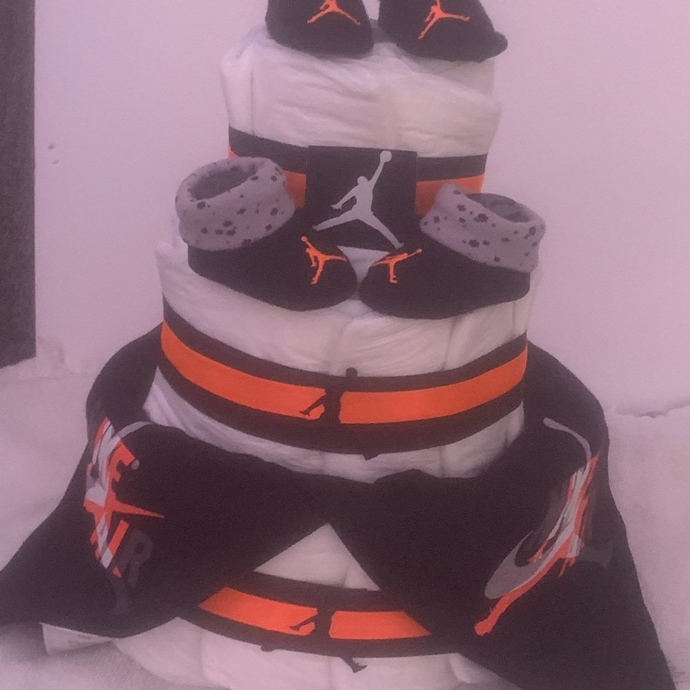 3 Tier Jordan Diaper Cake. Handmade. 30 diapers, 2 shoe socks and 2 baby bibs